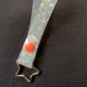 White tinted star jelly key fob with bright melon snap.